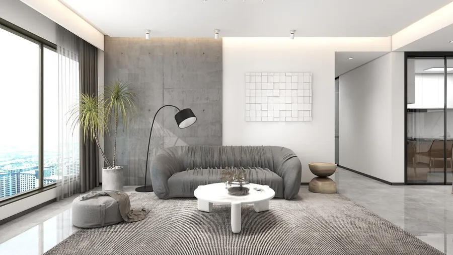 Modern living room with grey sofa white coffee table floor lamp green plant and rug