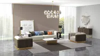 Modern living room beige sofa marble coffee table crystal ceiling light brown wall and rug