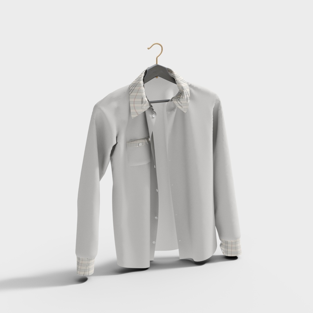 White cotton shirt with plaid collar and cuffs hanging on hanger on white background