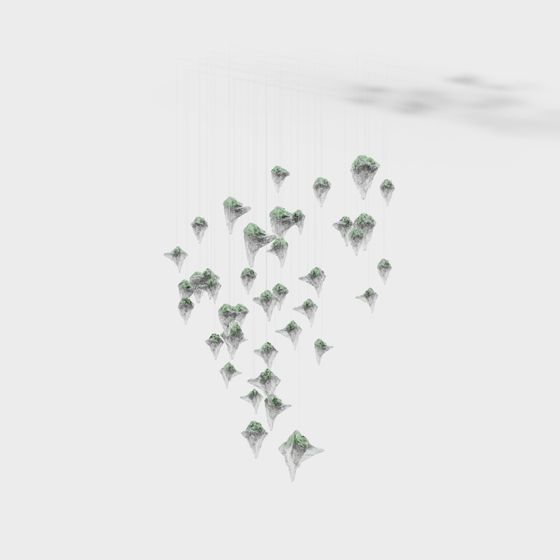 Modern hanging ceiling light with green and grey glass shapes on white background