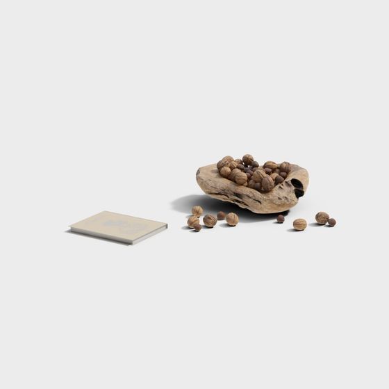 Rustic wooden bowl filled with brown walnuts and beige book on grey background