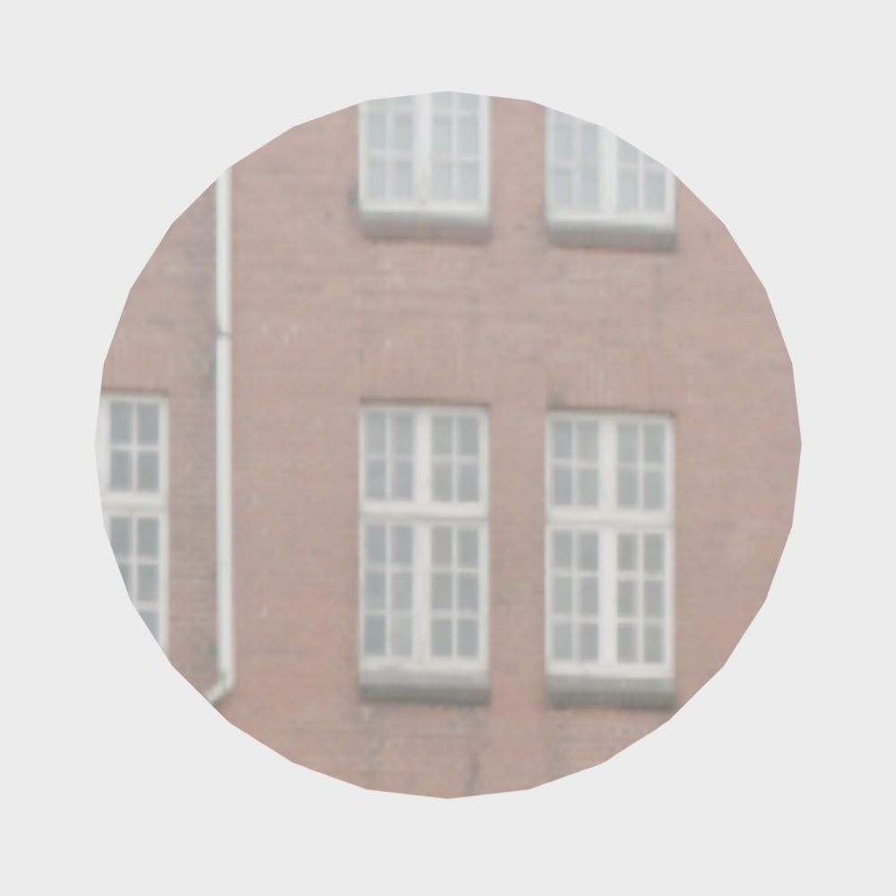 Red brick building facade with white framed windows and white downspout on grey background