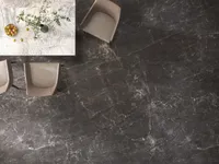Top view of dark marble floor with white stone table and chairs in modern room