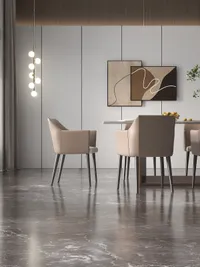 Modern dining room featuring dark marble floor stylish chairs wall art and hanging light fixture