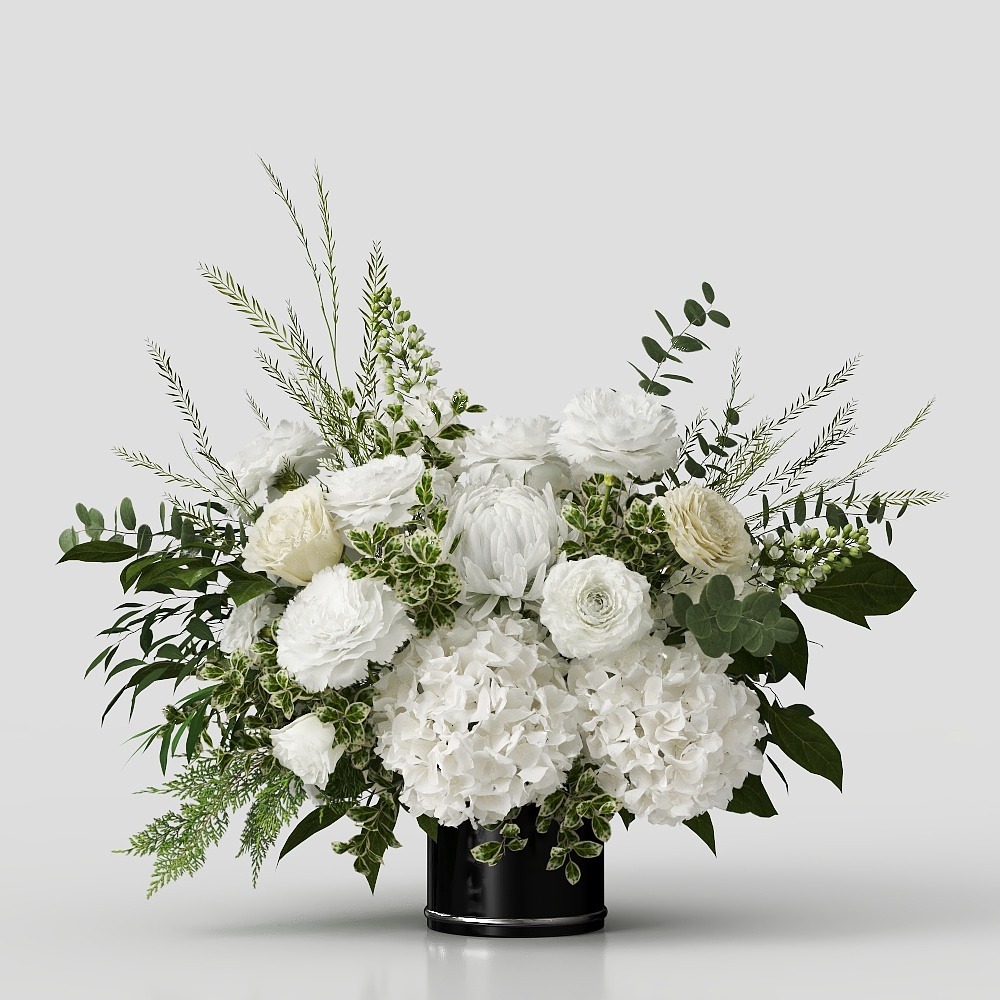 Modern white flower arrangement with green leaves in black vase on grey background