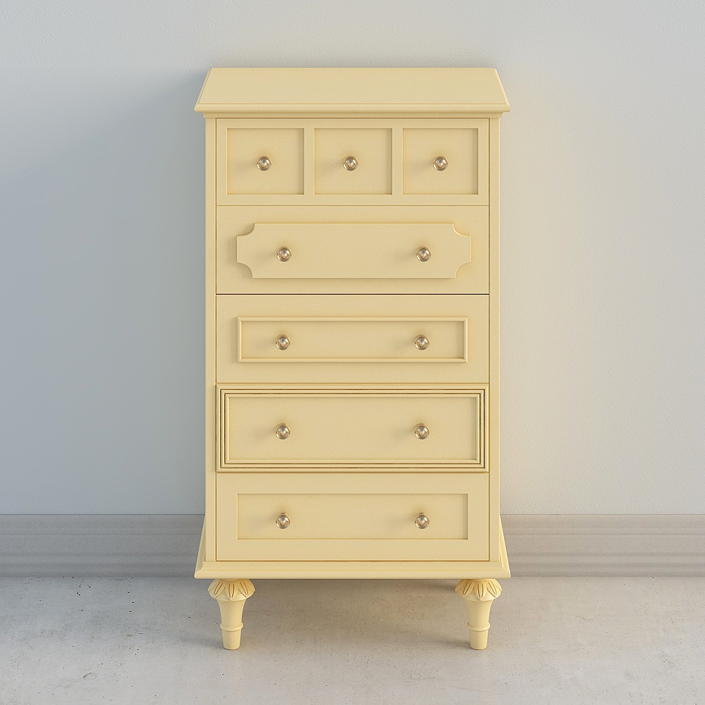 Yellow wooden cabinet with silver knobs and carved legs on white background