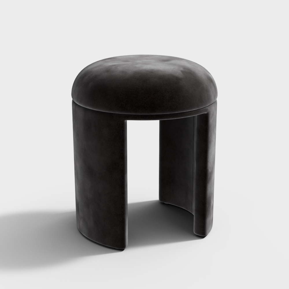 Modern black velvet round footrest with curved legs on white background