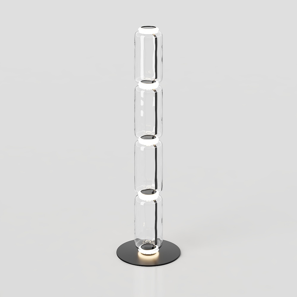Modern floor light fixture with four stacked clear glass cylinders and black round base on grey background