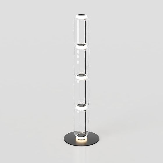 Modern floor light fixture with four stacked clear glass cylinders and black round base on grey background