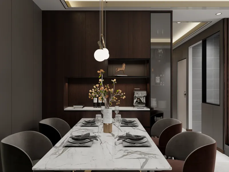 Modern dining room with marble table, grey chairs, dark wood cabinets, and globe ceiling lights